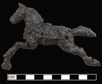 Cast iron horse with holes for attaching racing harness from 18MO609.